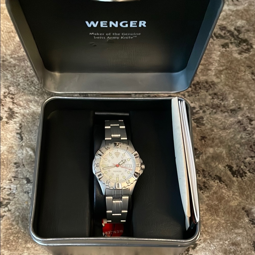 Wenger stainless steal watch with tags unworn